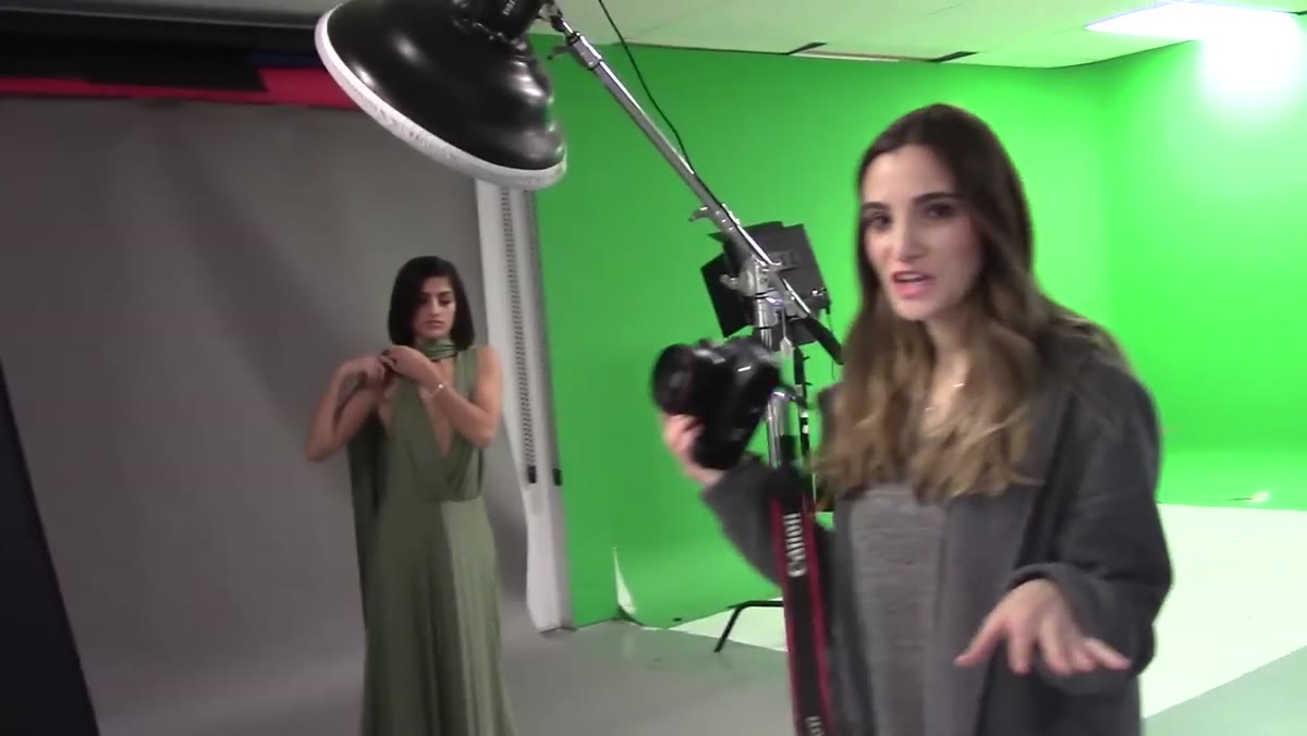 Jessica holding camera preparing to shoot