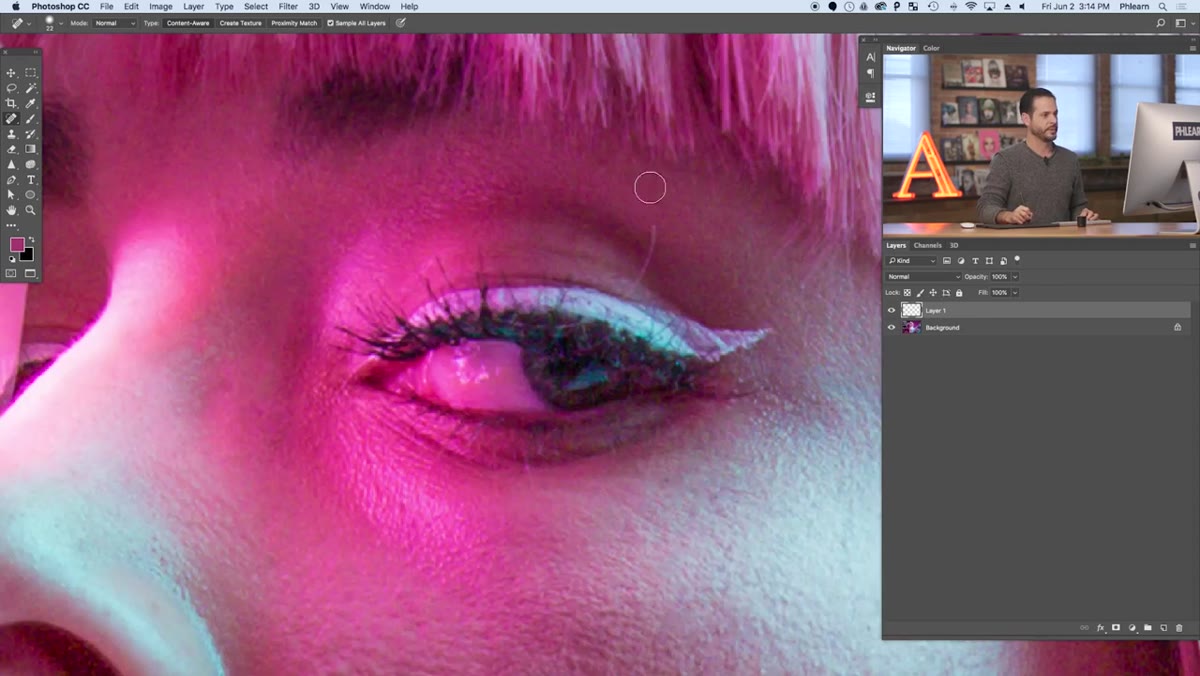 Pen tool drawing a path along the outer edge of the hair