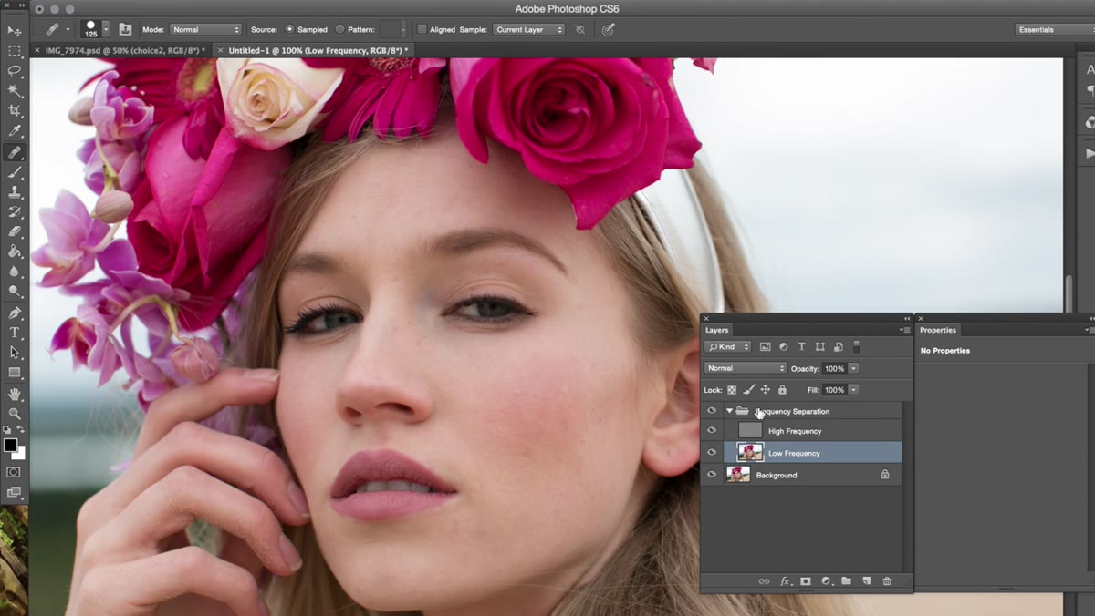 Frequency separation layers visible in the Photoshop layers panel
