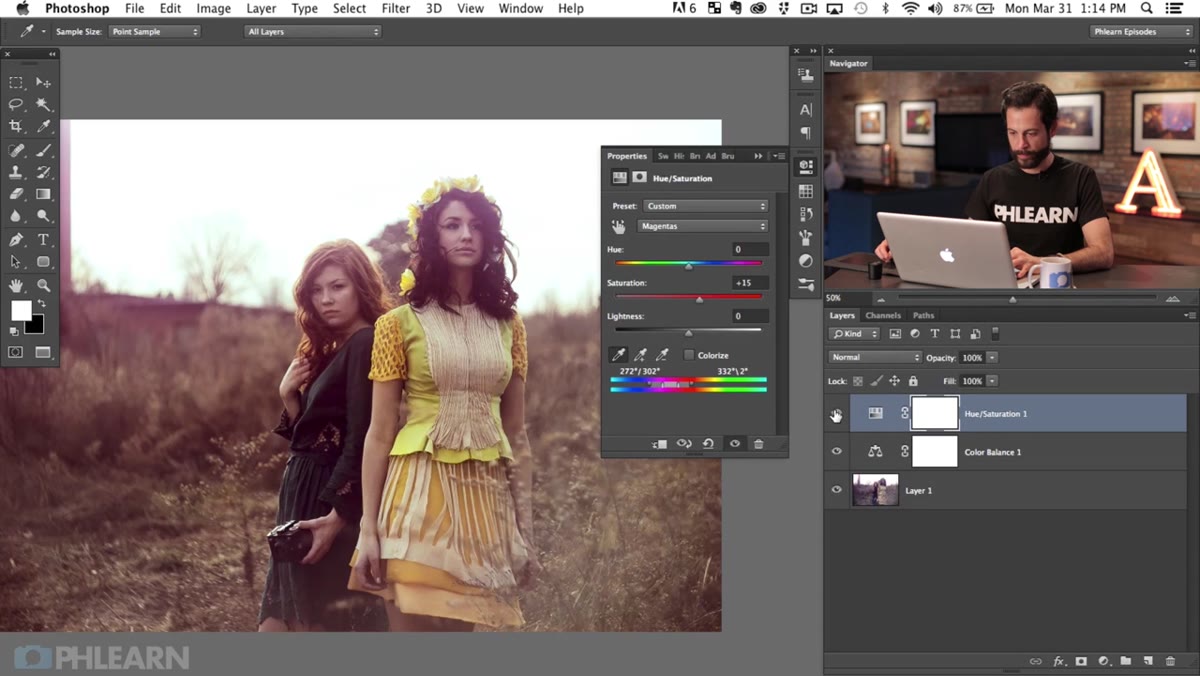 Layer mask being painted with black brush over background areas