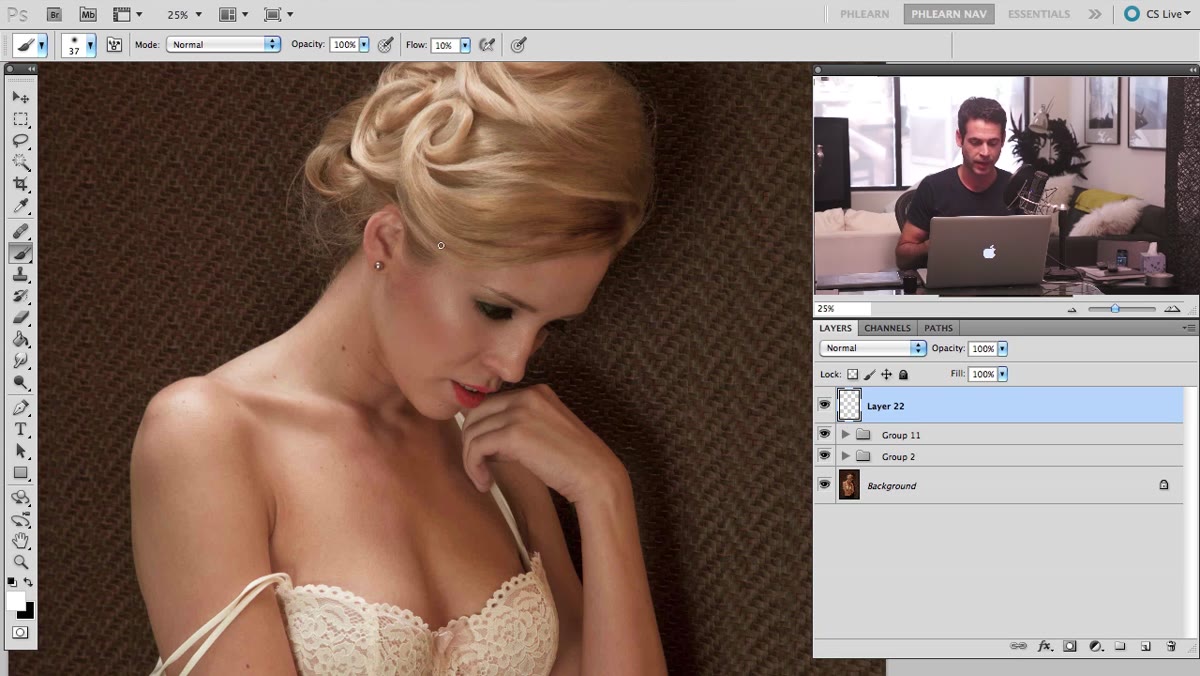 New blank layer created above the retouching stack in Layers panel