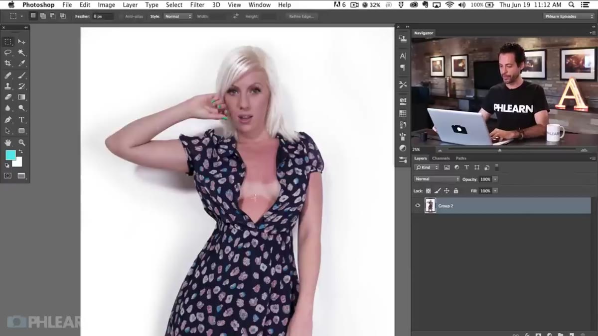 Aaron examining the tan line area on a portrait