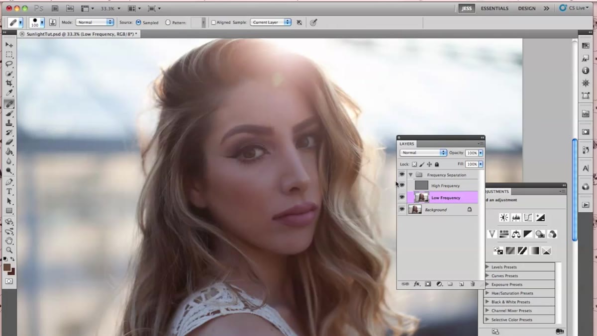 Low and high frequency folders visible in the Photoshop layers panel