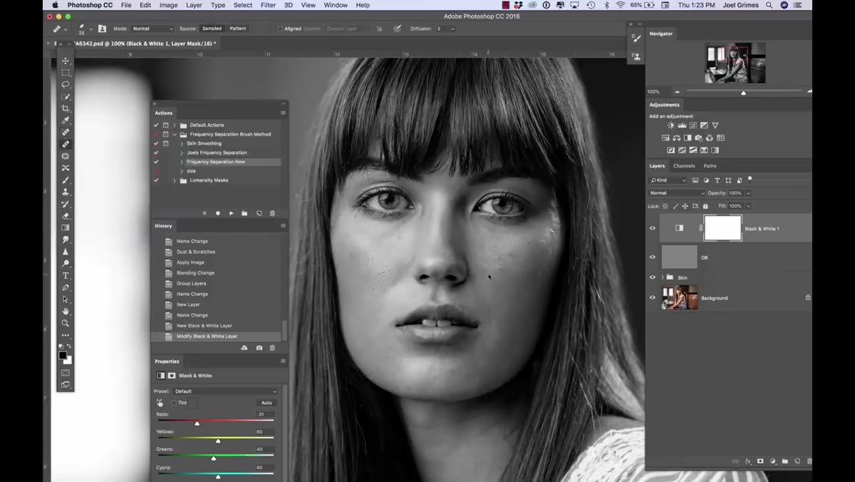 Healing Brush tool active with sample point set near a skin blemish
