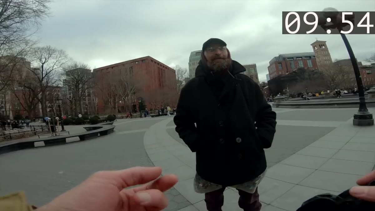 Pierre speaking directly to a stranger on the sidewalk