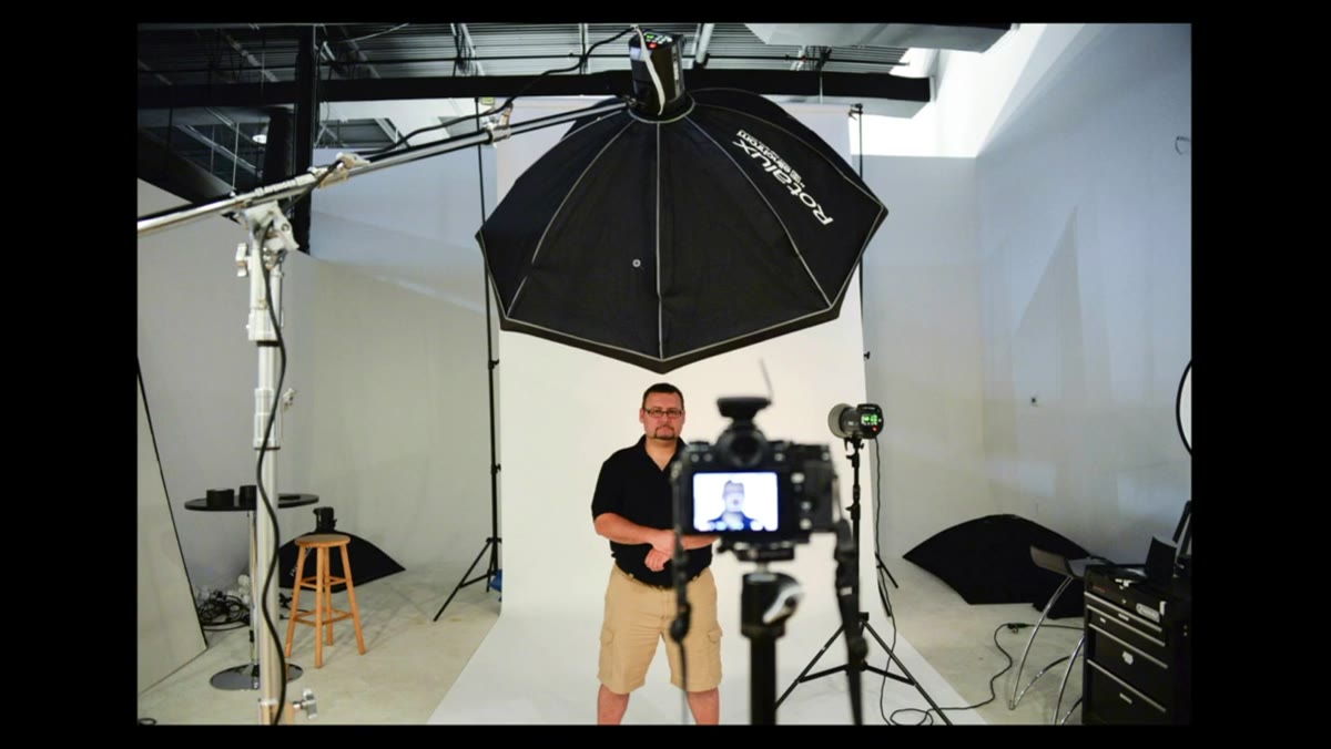 Large light source positioned high above subject at 45-degree angle