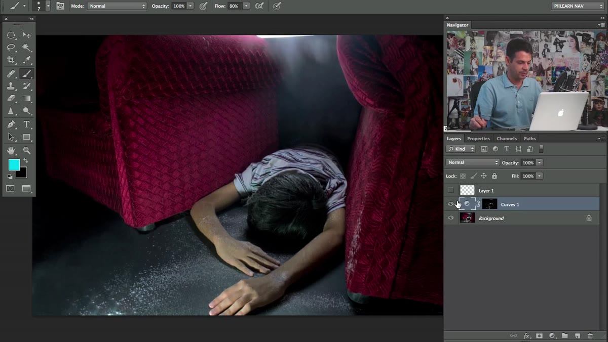 Brush tool painting black on layer mask to hide effect in specific areas