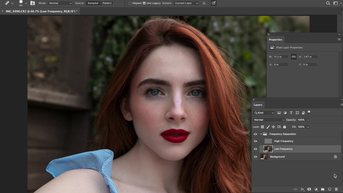 Photoshop workspace with frequency separation layers visible in Layers panel