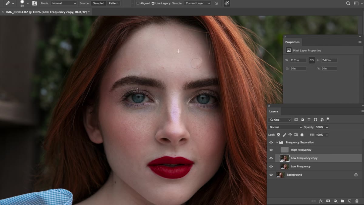 Healing Brush tool active, working on skin tone layer
