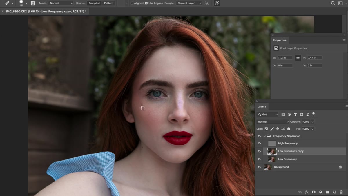 Clone Stamp tool active on high-frequency texture layer