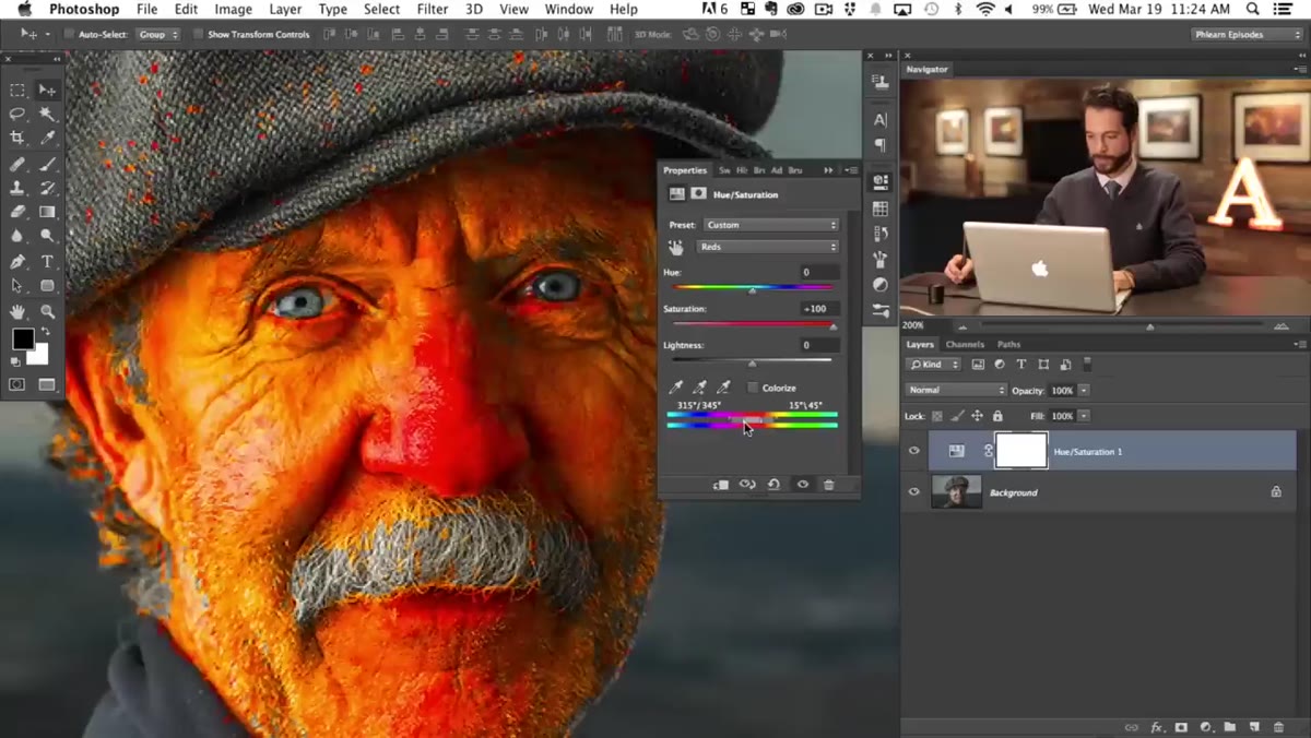 Color range bar at bottom of Hue Saturation panel with sliders being adjusted
