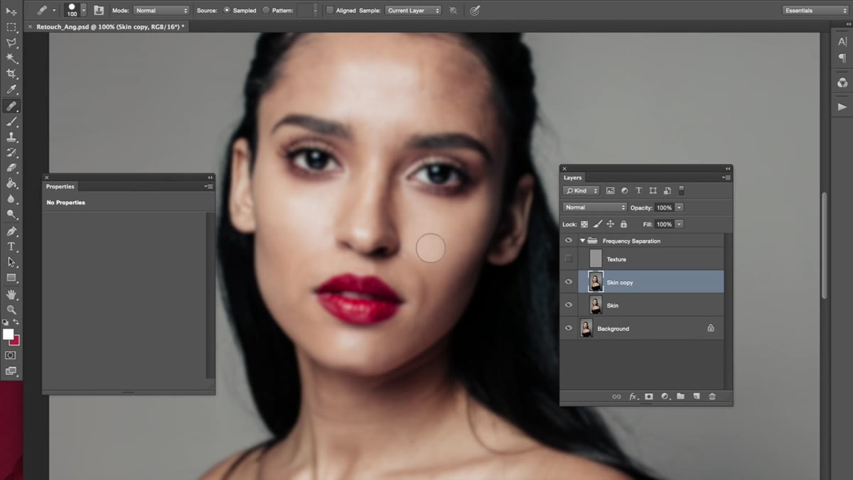 Close-up view, healing brush sampling clean skin area near blemish