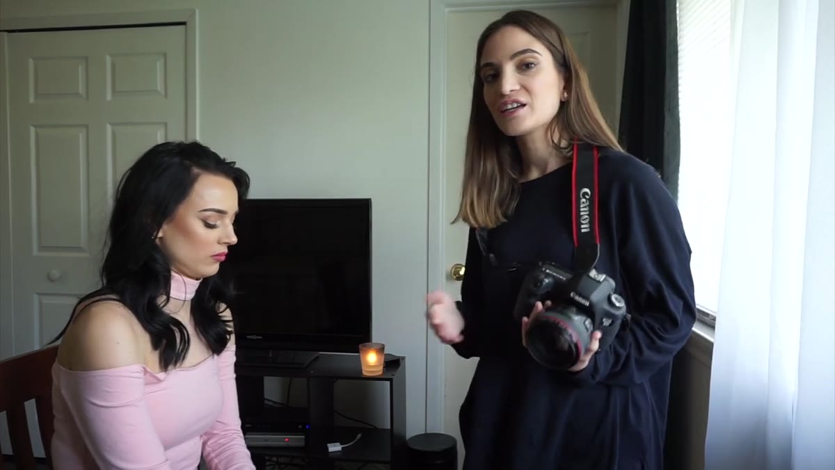 Full framing showing Jessica shooting with room around the face