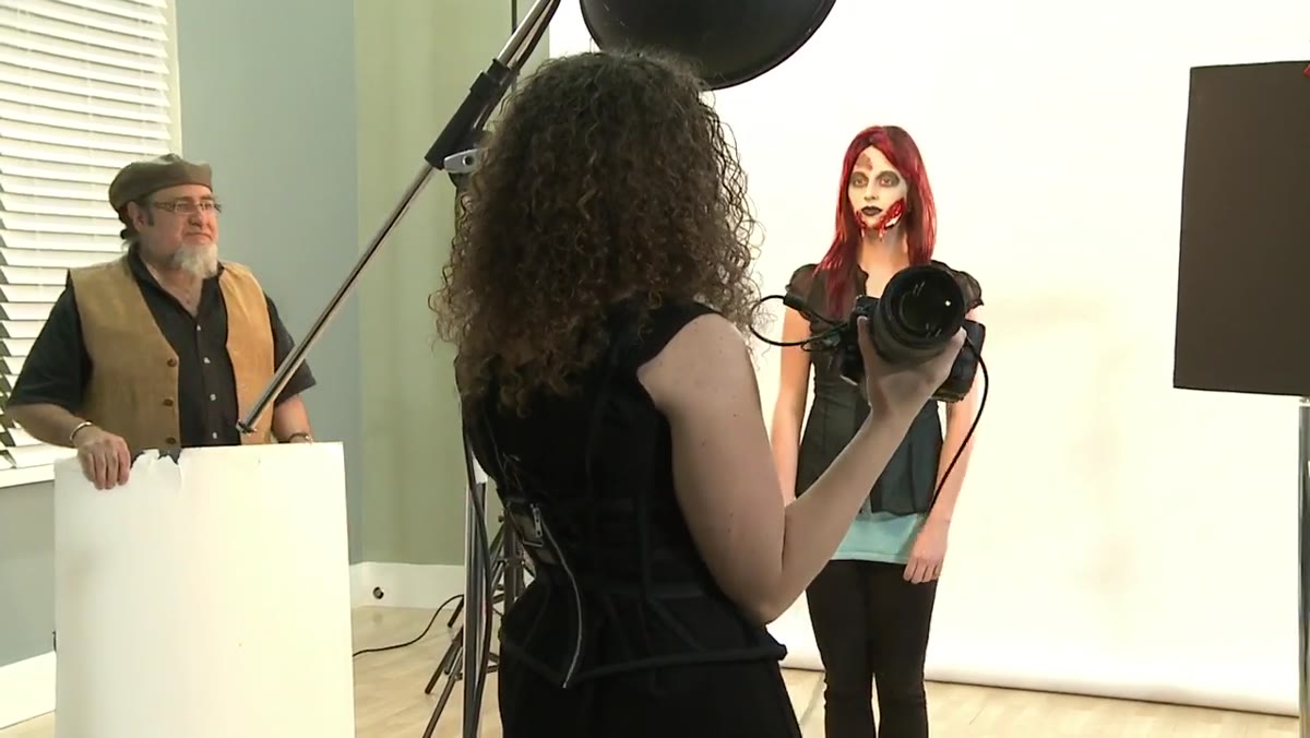 Subject moving forward toward camera, rim highlights shifting on face and shoulders
