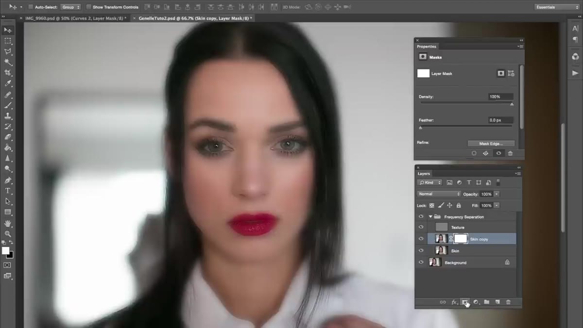 Black mask added to blurred layer, brush painting skin back in