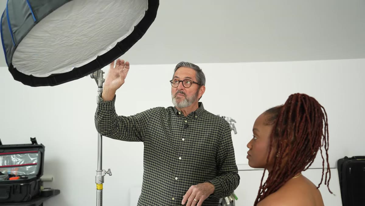 Light modifier positioned approximately 3 feet from subject
