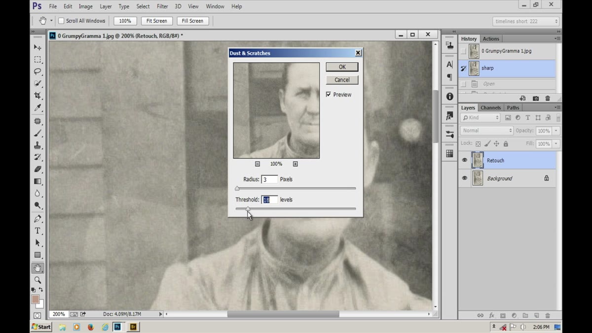 Threshold slider being raised inside Dust and Scratches dialog