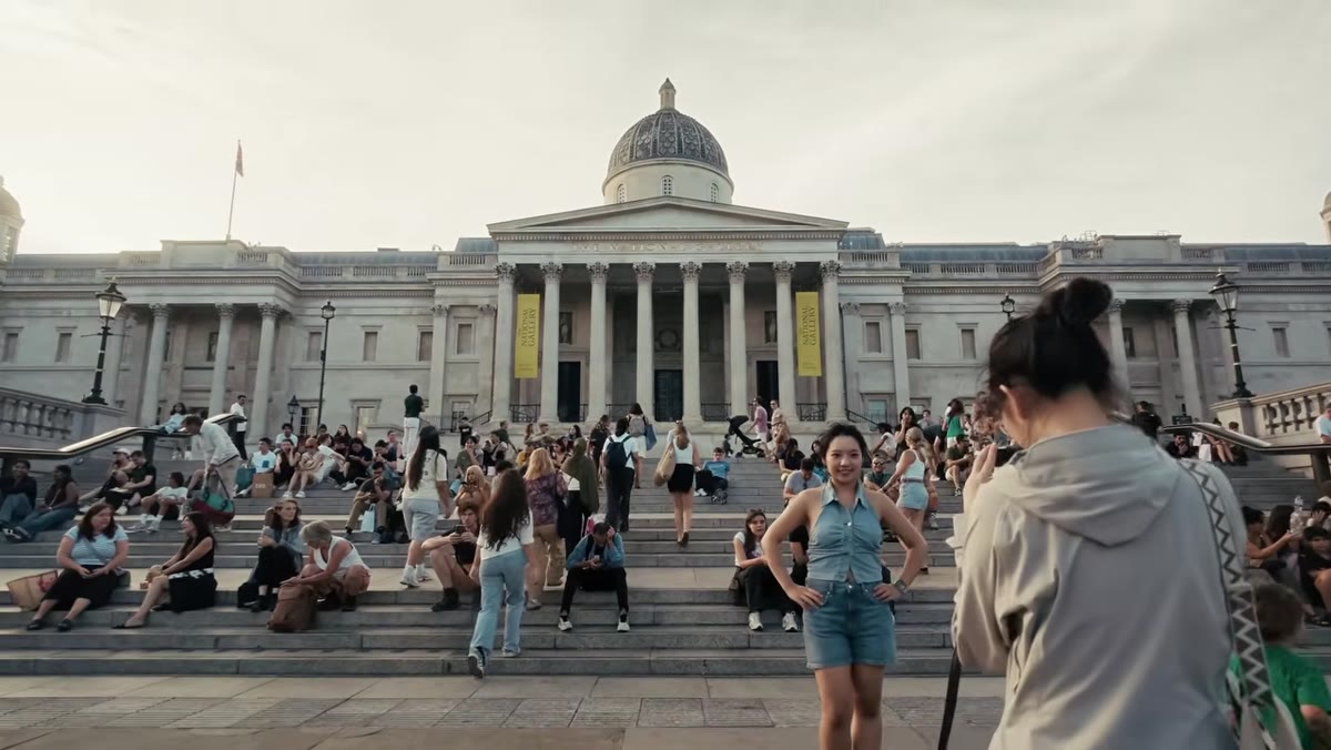 Tucker filming himself walking through Trafalgar Square