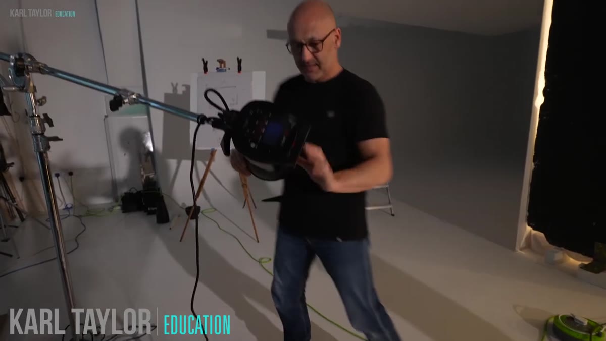 Projection attachment being fitted onto Godox light head