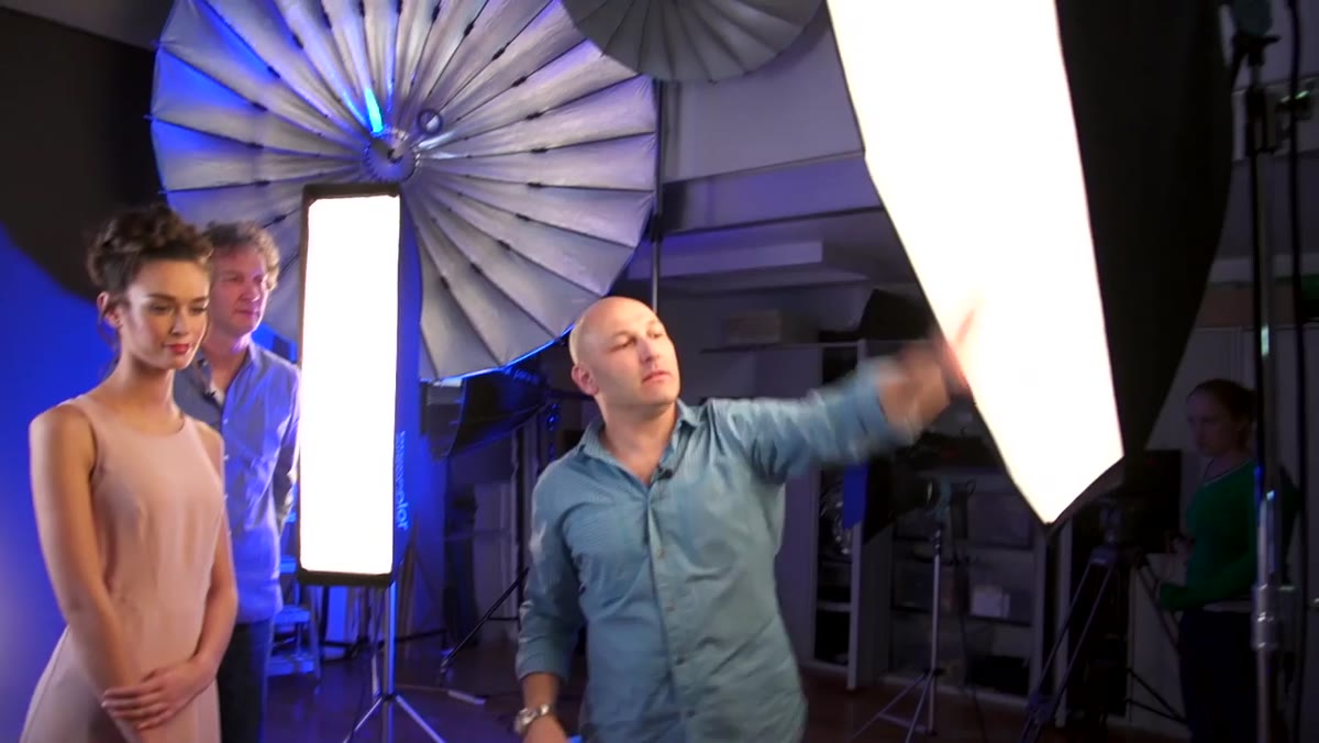 Strip softbox positioned for edge lighting on face