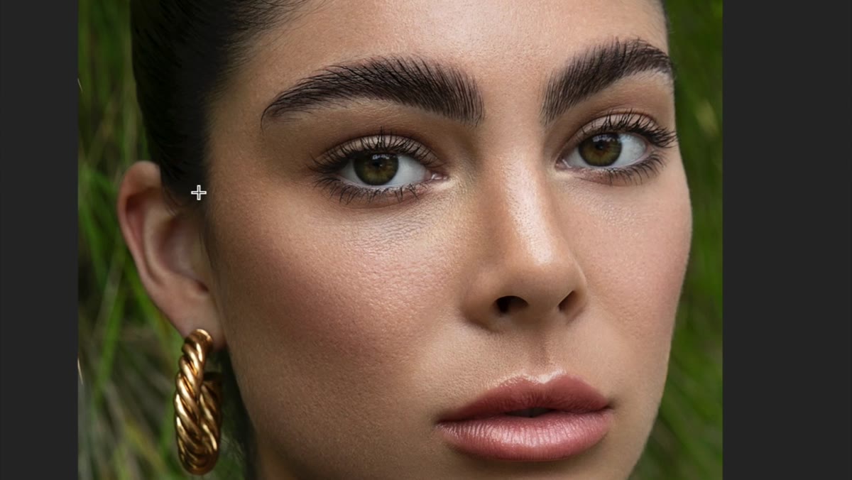 Skin texture visible in close-up of refined retouch