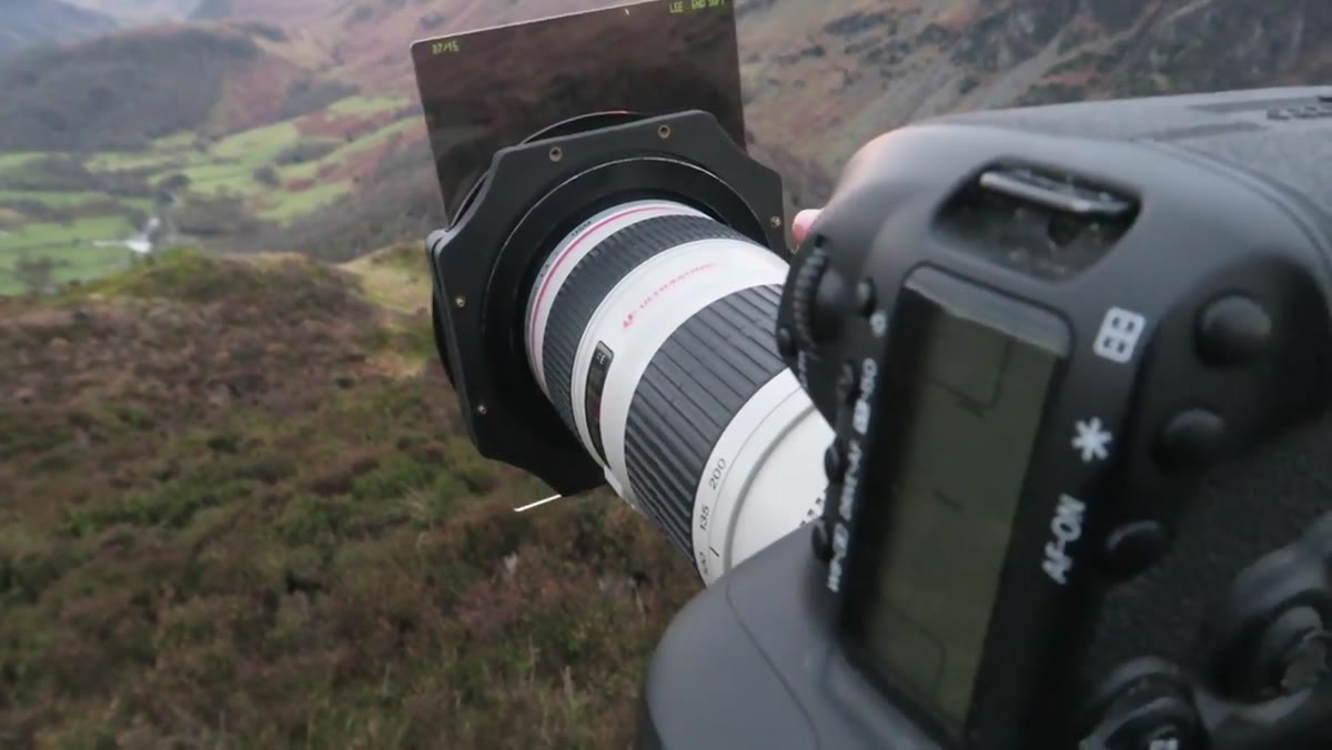 Tripod leveled and graduated filter positioned horizontally for panoramic